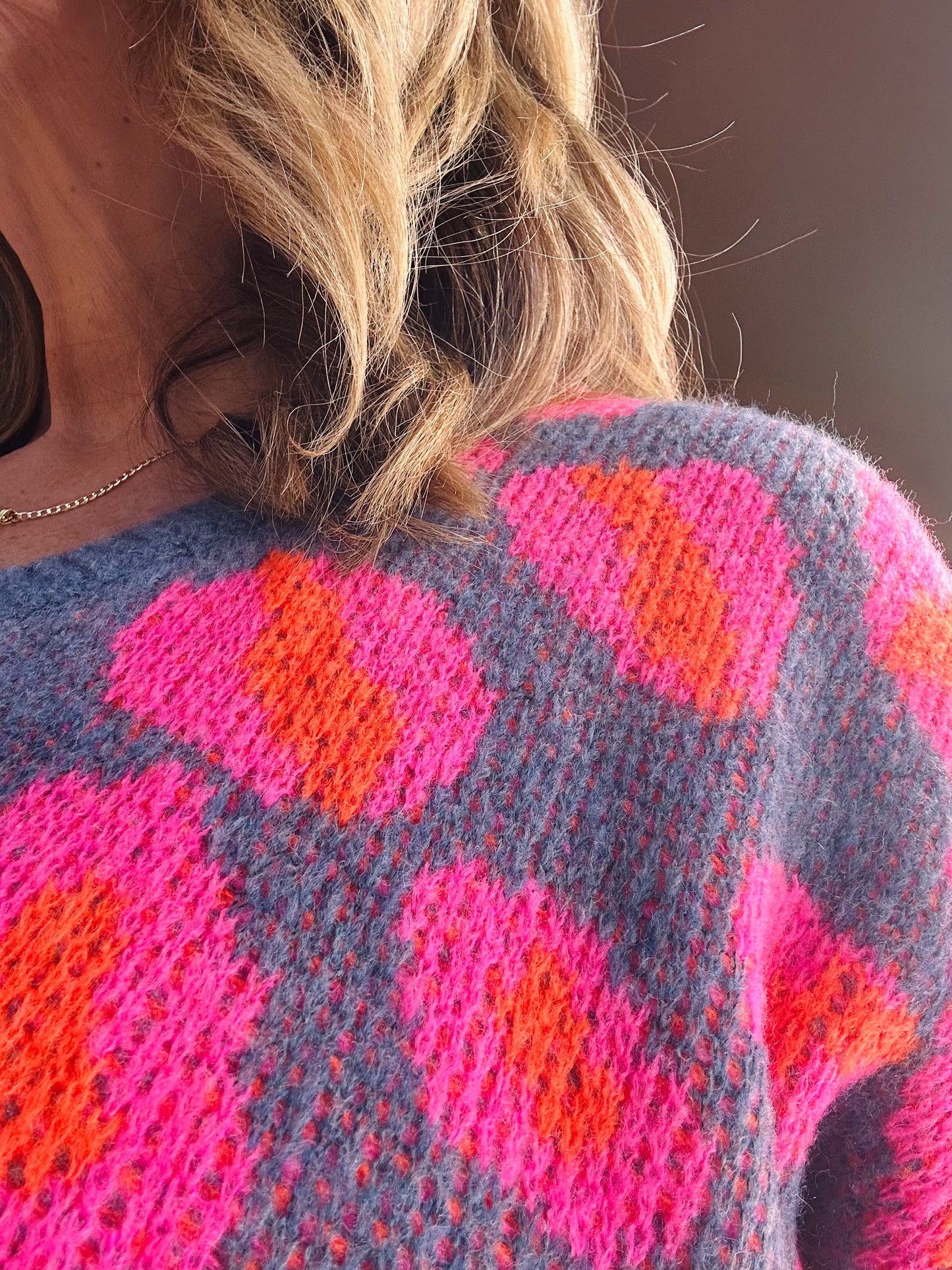 Super soft denim blue slouchy fit jumper with fuchsia and orange leopard hearts